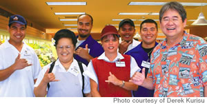 Derek Kurisu (right) with KTA Super Stores employees from left Maurino Urmwoanpiy, Nora Sasahara, Jason Rabang, Darlene Batulanon, Tim Cordero and Kristian Yogi