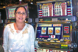 Lucky Feliza Begonia of Honolulu won $25,000 on a $5 slot machine while waiting for her luggage