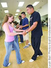 The author dances with instructor Charlie Castro
