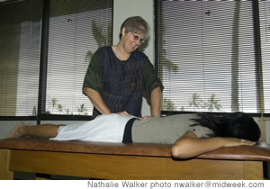 Karen Sept works on a patient at her Kailua office