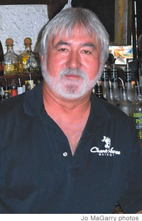 Longtime Chart House Waikiki bartender Guy Maynard