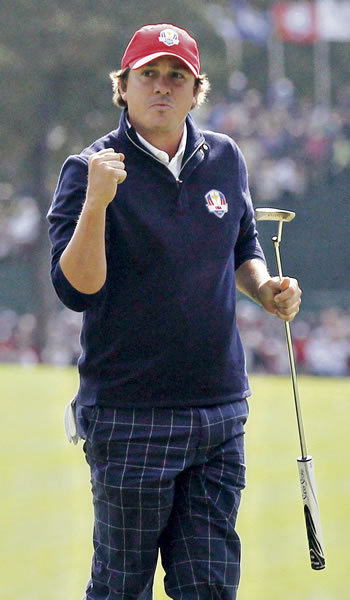 USA’s Jason Dufner reacts after making a putt to win a foresomes match at the Ryder Cup PGA golf tournament Sept. 28