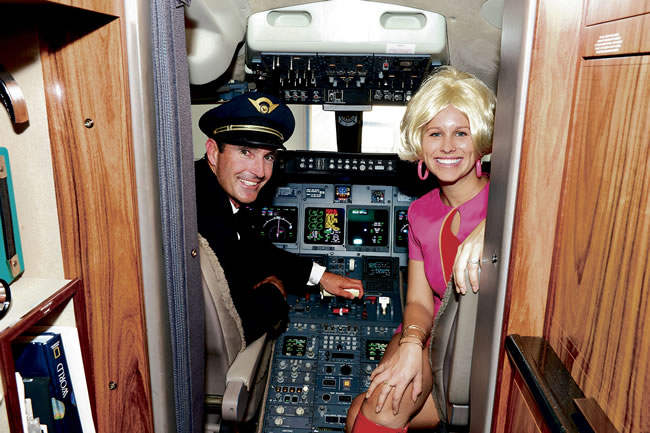 Dustin Sellers as captain and Noël Pietsch Shaw as flight attendant Nathalie Walker photo. nwalker@midweek.com