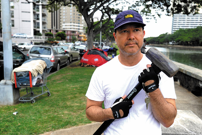 Rep. Tom Brower and his hammer. Honolulu Star-Advertiser photo