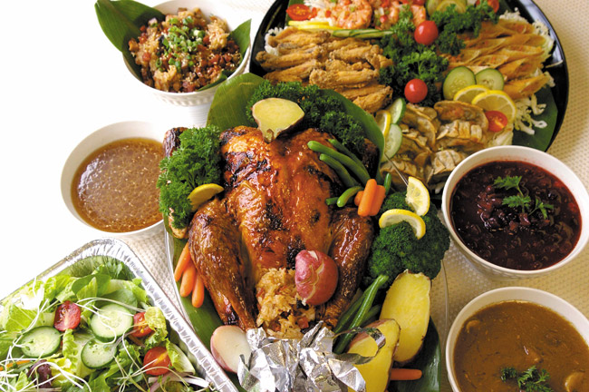 Dozens of restaurants and hotels offer turkey dinners to go - with a local twist. Panya Restaurant's (above) includes mochi rice, and Kahai Street Kitchen has Portuguese sausage stuffing | Jo McGarry photo