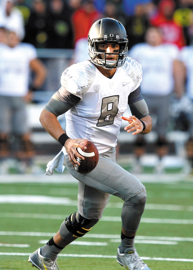 University of Oregon quarterback Marcus Mariota. AP photo/Rick Scuteri