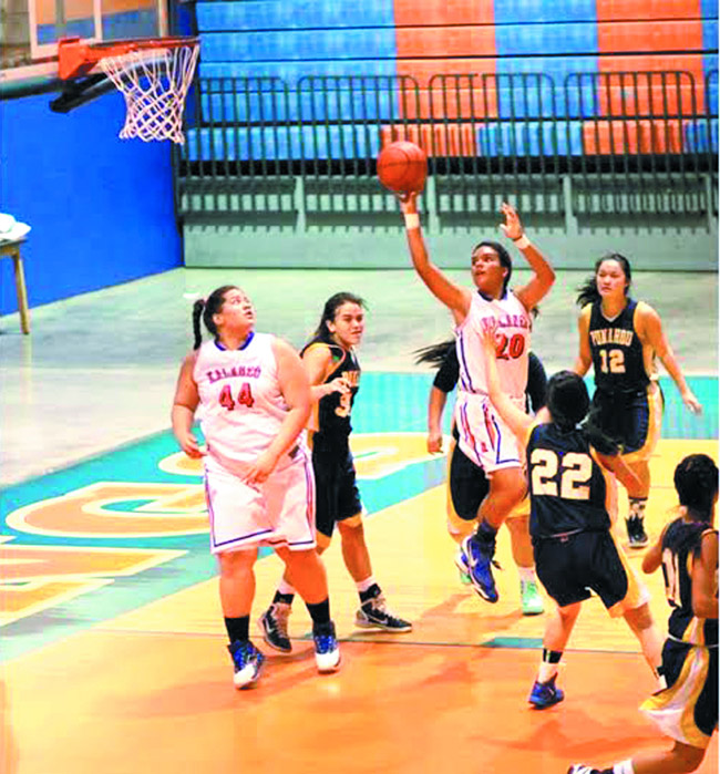 Shauna 'Ulu' Perry in action with Kalaheo teammates against Punahou. Photo from the Perry family.