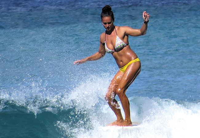 City lifeguard Jenny Lee surfing Photo courtesy Paul Teruya