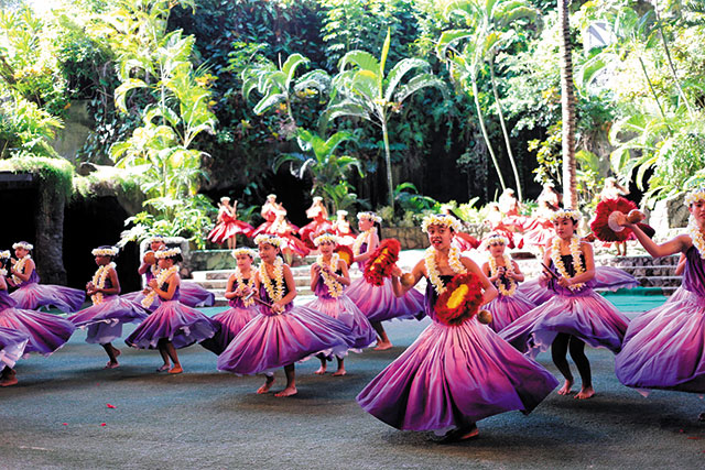 Halau Hula Olana of Aiea performed at Polynesian Cultural Center Jan. 18 during the 24th annual Moanikeala Hula Festival. The festival honors PCC's first kumu hula, Aunty Sally Moanikeala Wood Naluai. Photo courtesy Polynesian Cultural Center.