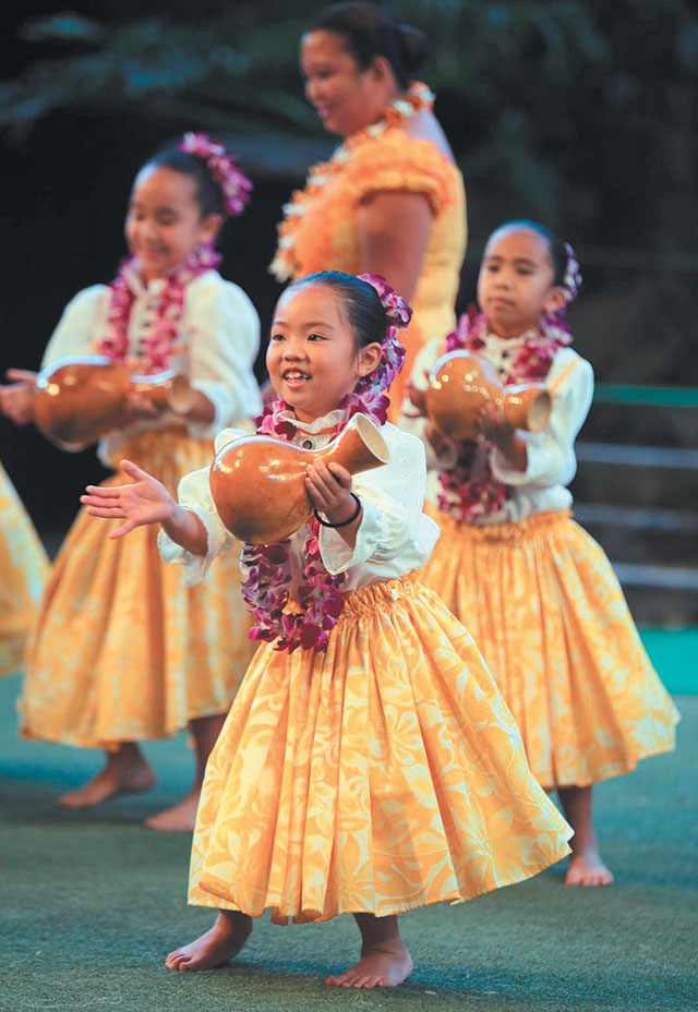 Keiki from the Aiea-based Ka Pa Nani O Lilinoe halau performed last month at Polynesian Cultural Center's 24th annual Moanikeala Hula Festival. The event hon-ors PCC's first kumu hula, Aunty Sally Moanikeala Wood Naluai. Photo from Polynesian Cultural Center.
