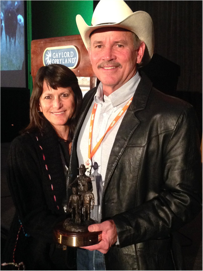 Carrie and John Morgan accept Kualoa Ranch's regional 2013 Environmental Stewardship Award at the 2014 Cattle Industry annual convention and trade show, held recently in Nashville, Tenn. Photo from Maya Pollock. 
