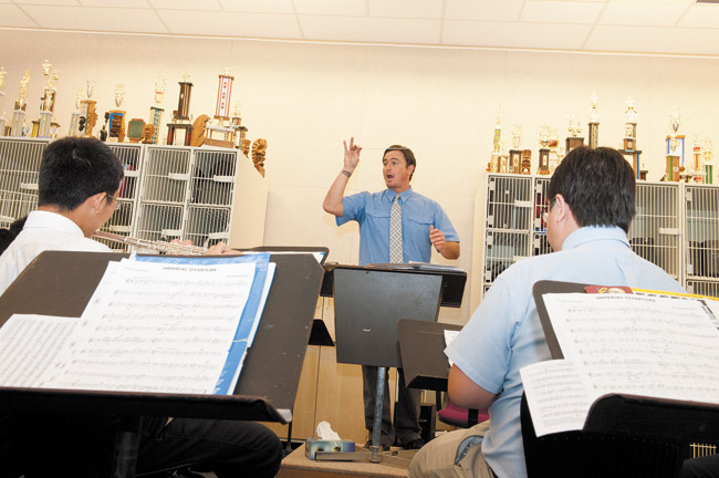 Saint Louis School band director Bret Shimabuku and his students rehearse for their April 30th spring concert | Nathalie Walker photo