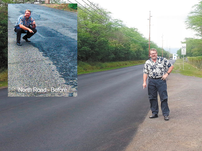State Rep. Bob McDermott shows what a big difference that paving North Road has made. Photo from Rep. McDermott's office. 