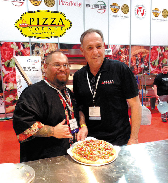 Pizza Corner's executive chef Jerome LaSorba II (left) and owner Frank Mento with their award-winning poke pizza at the International Pizza Challenge in Las Vegas. Photo from Frank Mento. 