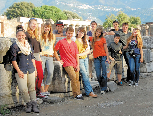 Trinity Christian School seniors explored Pompeii during their Grand Tour of Europe last fall. The travelers are (front, from left) Allie Murakami, Zoe Wilks, Jennifer Jacobsen, Timothy Metcalf, Mary Trahey, Amaris Capen, Nalani Meinken, Jessica Williams, Bobby Treakle, (back) Shaun Kanoho, Gabriel Arney and Ethan McGuire. This is way before they had to prepare for their senior theses, which each of them will present this week before judges at the Kailua school. Photo by Marcia Murakami. 