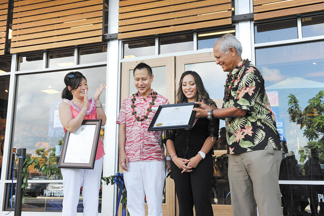 State Sen. Mike Gabbard (far right) and Rep. Sharon Har (far left) present certificates May 23 from the state Legislature to honor the new Pier 1 Imports store in Kapolei Commons shopping center. Also present are Pier 1 Imports regional manager Jeffrey Trinh and Kapolei store manager Leia Naehu. Photo from Sen. Gabbard. 