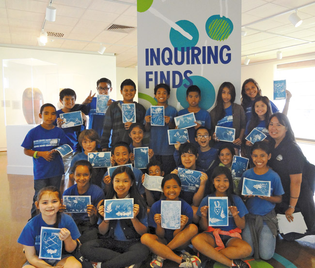 Holomua Elementary School in Ewa Beach was one of about 40 Oahu schools to visit the 'Inquiring Finds' exhibit at Honolulu Museum of Art's Spalding House in Makiki. Pictured here is Erin Imamura's fifth-grade class. Photo from HECO. 