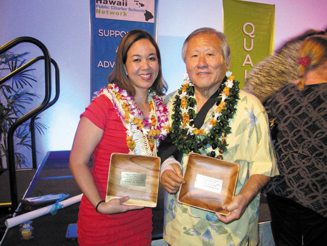 State Sen. Jill Tokuda and Rep. Ken Ito accept the 2013-14 Legislators of the Year award from Hawaii Public Charter Schools Network at the network's annual dinner May 15 at Dole Cannery Ballrooms, Among other awardees cited for their support of charter schools was K. Kahau Glassco of Ke Kula o Samuel Kamakau Laboratory Public Charter School in Kaneohe, named Governing Board Member of the Year. Photo from Roxanne Kamalu.