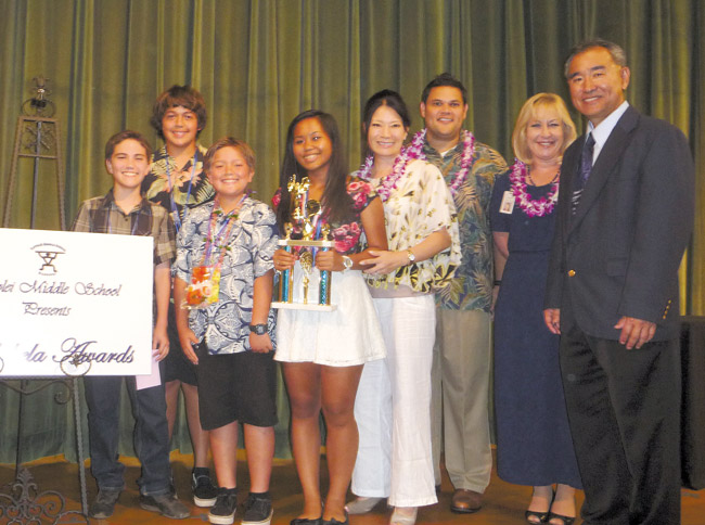 Among Kapolei Middle School's 192 recipients of this year's Po'okela Award are (from left) Rusty Neitzel (grade 7), Hunter Copp (grade 7), Cody Liu (grade 6) and Rachelle Lariba (grade 8). The students were presented with their awards by Reps. Sharon Har and Ty Cullen, complex area superintendent Heidi Armstrong, and principal Bruce Naguwa at a June 13 ceremony. Photo from Rep. Har's office.