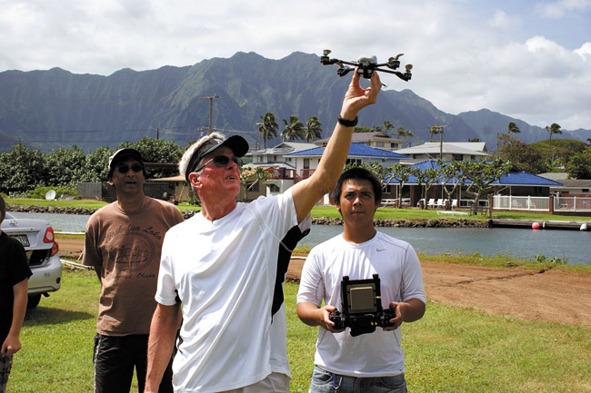 Getting set to launch a drone are (from left) Herb Lee Jr., Ted Ralston and Pookela Academy student Franklin Root, who is handling the remote controls. The academy's outdoor classroom is one of several that Castle High School has lined up with community partnerships to bring hands-on learning into the curriculum. Photo from Castle Redesign.
