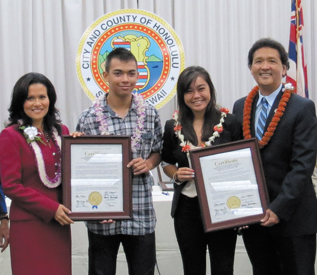 City Councilmembers Kymberly Pine and Ron Menor presented honorary certificates to recent Campbell High graduates Zachary Recolan and Kawehi Dodge. Photo from Ron Menor's office. 