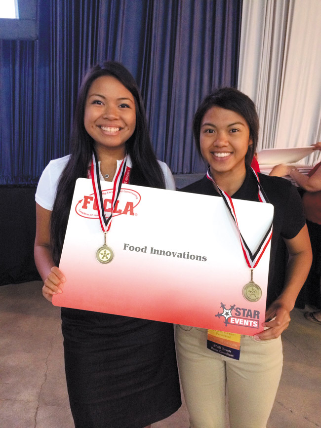 Jalen Payongayong (left) and Kelsey Cruz took home gold medals and a perfect score at the FCCLA national conference. Photo from Jeffrey Sampson. 