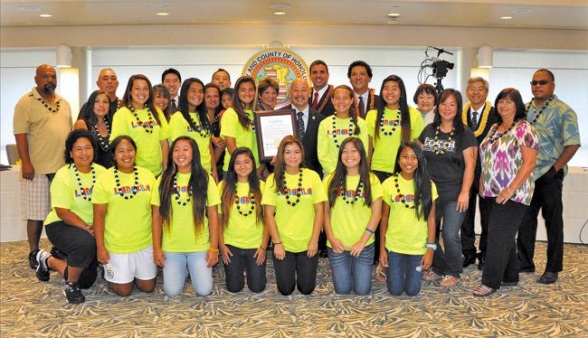 Lanakila Soccer Team, with City Councilmembers in back, was honored by the council for its excellent performance at the AYSO National Games June 29-July 7 in Irvine, Calif. The Mililani-based girls team took first place and went undefeated with a final-combined score of 27-0. Photo from Honolulu City Council.