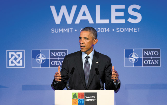 U.S. President Barack Obama speaks during a media conference after a NATO summit at the Celtic Manor Resort in Newport, Wales, Sept. 5. AP PHOTO, JON SUPER 