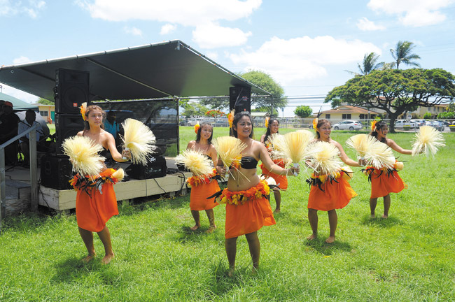 An Ewa Beach-based halau entertained the crowd with Tahitian dancing during the fundraiser. Photo by Lawrence Tabudlo, ltabudlo@midweek.com. 