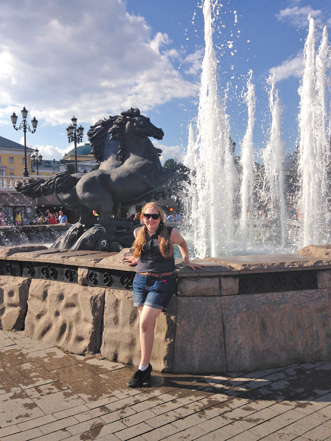 Zoe Sprott poses in front of a fountain near Red Square in Moscow. The teen traveled to Russia to study the language. Photo from the Sprott family. 