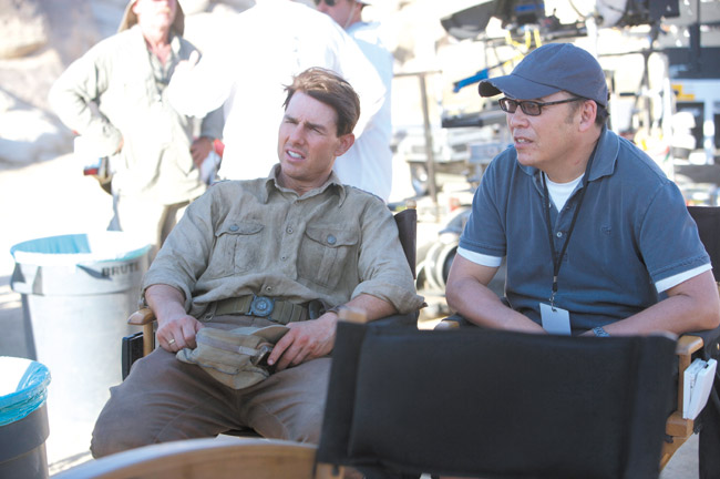 Chris Lee, executive producer of 'Valkyrie,' shares a moment with the film's star, Tom Cruise. PHOTO COURTESY UNITED ARTISTS 