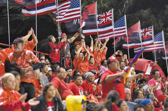 Kahuku Red Raiders fans cheering in the stands ANTHONY CONSILLIO PHOTO