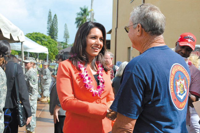 After speaking at the Oct. 31 dedication of Schofield Barracks' Warrior Transition Battalion Headquarters and Soldier & Family Assistance Center, U.S. Rep. Tulsi Gabbard met with veterans and service members attending the ceremony. Photo from Gabbard's office. 
