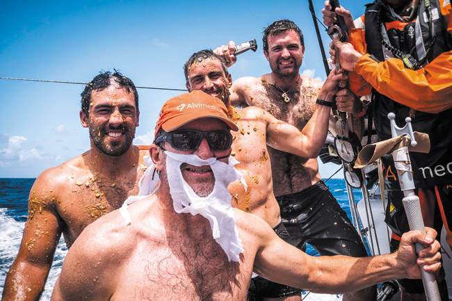 King Neptune makes a visit to Team Alvimedica to welcome (from left) Mark Towill, Alberto Bolzan and Charlie Enright as they sail across the equator for the first time. Will Oxley is bearded King Neptune AMORY ROSS / TEAM ALVIMEDICA / VOLVO OCEAN RACE photo