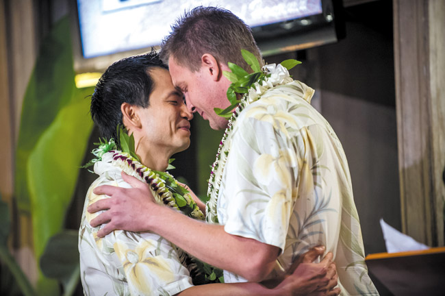 Jonipher Kwong and Chris Nelson wed Dec. 2 shortly after midnight on the first day same-gender marriages become legal in Hawaii DWIGHT MORITA PHOTO