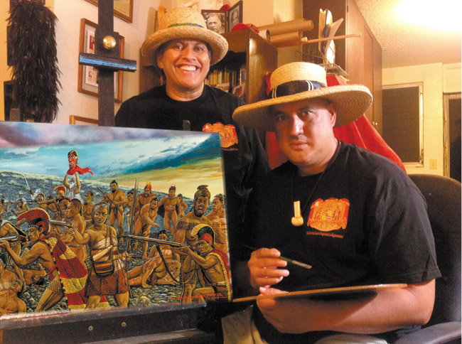 Drena and Brook Parker showcase one of his prized works of art: an original oil painting of Manono and Kekuaokalani at the Battle of Kuamoo Bay in South Kona in 1819 PHOTO FROM KEALA PARKER