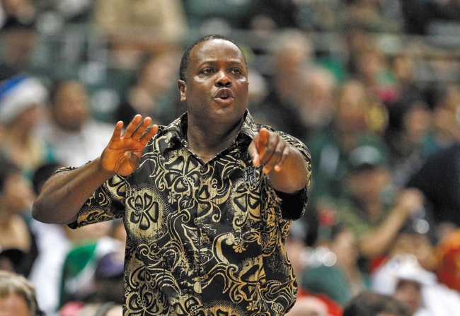 Hawaii head coach Benjy Taylor gestures from the sideline during the second half of a men's college basketball game in the 2014 Diamond Head Classic between Hawaii Rainbow Warriors and Colorado Buffaloes Dec. 25 at Stan Sheriff Center. Hawaii held on to win 69-66 to take third place JAMM AQUINO / STAR-ADVERTISER PHOTO