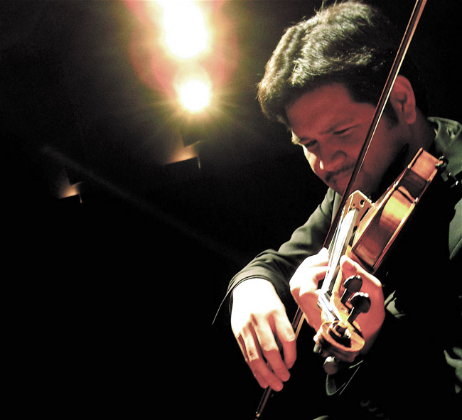 Michael-Thomas Foumai enjoys playing the violin, but he has chosen the path of a composer for life PHOTO COURTESY HANA LEE 