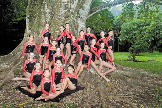 Kokokahi Gymnastics Team is shown getting back to its roots at Ho‘omaluhia Botanical Garden, prior to the team's annual gymfest this weekend at Le Jardin Academy. The event is known for featuring future Olympians, such as Amand Borden and Japan's Miho Takenaka. Photo from the team. 