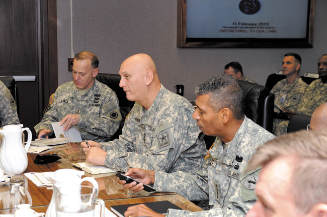 Gen. Raymond T. Odierno (center), chief of staff of the Army, and Gen. Vincent K. Brooks (right), U.S. Army Pacific commanding general, sit together during a brief at USARPAC headquarters SGT. JORGE HIGUERA/U.S. ARMY PUBLIC AFFAIRS PHOTO  