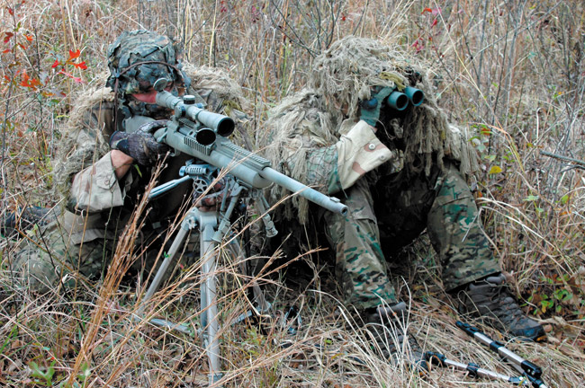An American sniper with M24 SWS rifle and his spotter U.S. ARMY RANGERS PHOTO