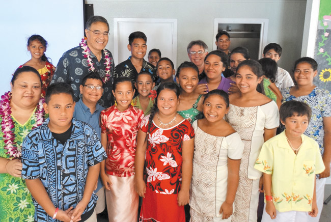 The author with Dr. James Skouge and Mautumua Porotesano of Pacific Voices with Le Fetuao students at their technology camp PHOTO COURTESY ALICE SILBANUZ