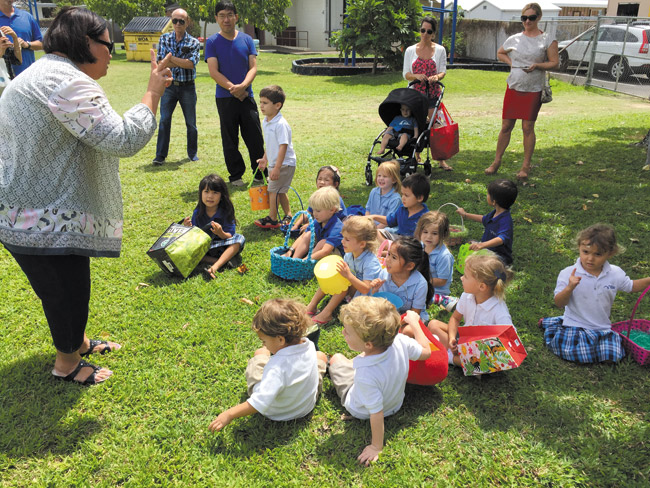 Holy Nativity Keiki 3's teacher Stanell Koanui gives instructions for a candy-free Easter hunt. The treat afterward was a fruit bar PHOTO FROM TANNYA JOAQUIN 