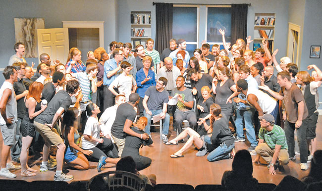 A flood of actors perform during a previous One-Minute Play Festival. Photo courtesy of One-Minute Play Festival