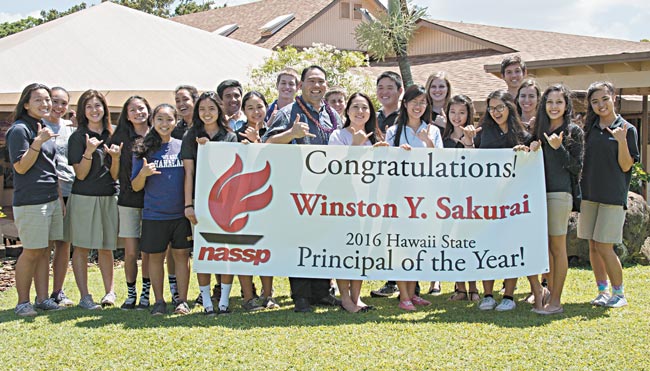 Students at Hanalani Schools celebrate with principal Winston Sakurai and his wife, Rochelle, May 6 after he was named Principal of the Year. PHOTO FROM HANALANI SCHOOLS.
