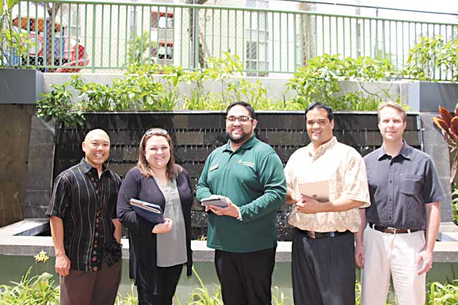 Sagely founders Todd Funasaki (far left) and Jeff Malins (far right) with The Plaza Assisted Living regional director Tricia Medeiros, activity director Eric Domingo and director of marketing and branding Tony Buhain