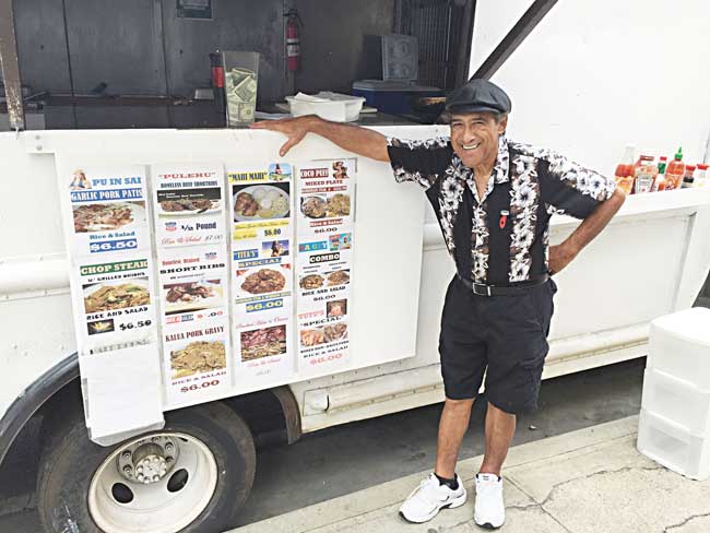 'Singing Chef' Iva Kinimaka at his Iva's Hawaiian Grinds food truck on Sand Island Photo from Mufi Hannemann