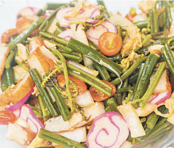 This fern shoot salad includes lots of local favorites PHOTO FROM COOKING HAWAIIAN STYLE