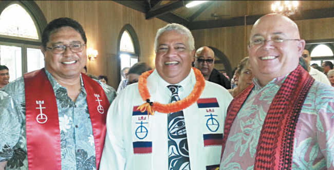 Reverends Iese Tuuao (left) and Ron Williams (right) congratulate newly ordained Rev. Randy Reynoso at Ewa Community Church May 17. PHOTO FROM LORI ARIZUMI.