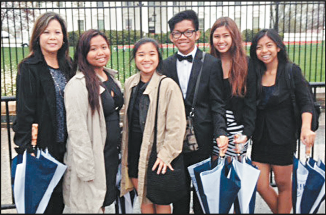 Waipahu High teacher and student activities coordinator Joy Takara (from left) with students Clarissa Gomez, Sally Millon, Mc Erl Dave Andres, Sherrie Mae Gracie and Ashley Mae Macadangdang in front of the White House April 11-14 during a GRAMMY Museum-spon- sored workshop on “The History of Gospel Music.” PHOTO FROM JOY TAKARA.